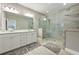 Modern main bathroom with a double sink vanity, a glass shower and tile floors at 4202 Morrison Way # 9, Atlanta, GA 30341