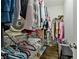 Walk-in closet featuring ample storage space and hardwood floors at 4202 Morrison Way # 9, Atlanta, GA 30341