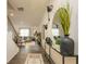 Stylish hallway with decorative mirror, console table, and view into the living room at 4936 Jatoba Rd, Acworth, GA 30101