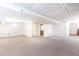 A large basement space featuring neutral carpet and potential for various uses at 746 Gladstone Nw Rd, Atlanta, GA 30318
