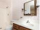 Bathroom featuring classic fixtures, wallpaper, and a walk-in shower at 746 Gladstone Nw Rd, Atlanta, GA 30318