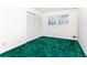 Cozy bedroom features carpet, closet, and bright window at 746 Gladstone Nw Rd, Atlanta, GA 30318
