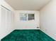 Simple bedroom features closet and bright window at 746 Gladstone Nw Rd, Atlanta, GA 30318
