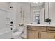 Clean bathroom with white fixtures and plenty of storage at 159 Sunshower Rdg, Canton, GA 30114