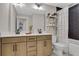 Bathroom featuring a double vanity and shower with black honeycomb tile at 159 Sunshower Rdg, Canton, GA 30114