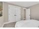 Bedroom with carpeting, double closets, and bright white trim at 159 Sunshower Rdg, Canton, GA 30114