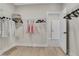 Walk-in closet with wire shelving and hanging rods for optimal storage at 159 Sunshower Rdg, Canton, GA 30114