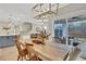 Open-concept dining area seamlessly connects to the living room and kitchen for easy entertaining at 159 Sunshower Rdg, Canton, GA 30114