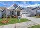 Charming craftsman-style home with a stone accent, covered porch, and well-manicured lawn at 159 Sunshower Rdg, Canton, GA 30114