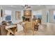 Bright living room featuring a brick fireplace and lots of natural light at 159 Sunshower Rdg, Canton, GA 30114