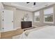Bright main bedroom with a dresser, tray ceiling, and lots of natural light at 159 Sunshower Rdg, Canton, GA 30114