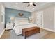 Comfortable main bedroom with accent wall, tray ceiling, and lots of windows at 159 Sunshower Rdg, Canton, GA 30114
