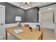 Beautiful home office space with natural light, wood floors, and white trim at 159 Sunshower Rdg, Canton, GA 30114