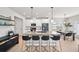 Stylish kitchen with island seating, stainless steel, and ample cabinet space at 191 Madison Bnd, Woodstock, GA 30188