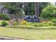 North Pointe community sign surrounded by lush green landscaping at 241 Tweed Ct, Sugar Hill, GA 30518