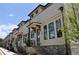 Elegant townhome exteriors showcasing brick accents, covered entrances, and well-maintained landscaping at 285 White St # 4, Marietta, GA 30060