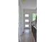 Bright hallway featuring hardwood floors, natural light, and modern staircase at 285 White St # 4, Marietta, GA 30060
