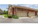 Spacious two-car garage with attractive doors, set in a well-maintained brick exterior at 5029 Rosalie Rd, Johns Creek, GA 30022