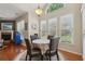 Charming dining area with abundant natural light, ideal for enjoying meals at 895 Mill Garden Pl, Cumming, GA 30040