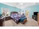 Beautifully decorated bedroom with tray ceilings, large window and coordinated furniture set at 977 Frog Leap Trail Nw, Kennesaw, GA 30152