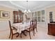 Elegant dining room with large windows and chandelier perfect for entertaining and Gathering meals at 977 Frog Leap Trail Nw, Kennesaw, GA 30152