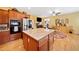 Open kitchen featuring granite countertops, stainless appliances, and a breakfast nook at 977 Frog Leap Trail Nw, Kennesaw, GA 30152