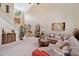 Comfortable living room featuring a large sectional sofa and high ceilings at 977 Frog Leap Trail Nw, Kennesaw, GA 30152