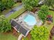 Aerial view of the neighborhood swimming pool and playground with chairs and umbrellas at 977 Frog Leap Trail Nw, Kennesaw, GA 30152