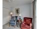 Bright room featuring 2 comfy chairs, a window, and soft carpeting at 1818 Mcconnell Rd, Grayson, GA 30017