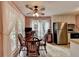 Charming breakfast nook with a wood table and large windows offering outdoor views at 1818 Mcconnell Rd, Grayson, GA 30017