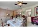 Dining space with a view of the kitchen, perfect for Gathering meals and entertaining guests at 1818 Mcconnell Rd, Grayson, GA 30017
