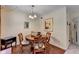 Comfortable dining area featuring a round wooden table, seating for four, and soft, neutral decor at 1818 Mcconnell Rd, Grayson, GA 30017