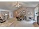 Bright, open living space featuring a fireplace, vaulted ceilings, and neutral tones at 1818 Mcconnell Rd, Grayson, GA 30017