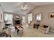 A cozy living room with a fireplace, neutral tones, and comfortable seating at 1818 Mcconnell Rd, Grayson, GA 30017