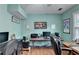 Well-lit home office with wood floors, neutral paint, and functional layout, perfect for productivity at 1818 Mcconnell Rd, Grayson, GA 30017