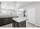 Modern kitchen with granite countertops, stainless steel appliances, gray cabinets, and an island at 2493 Oakleaf Rdg, Lithonia, GA 30058