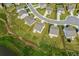 A neighborhood aerial view highlighting the manicured lawns and the neighborhood design at 49 Ryder Pass Way, Loganville, GA 30052