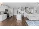Modern kitchen featuring white cabinets, a center island, and stainless steel appliances at 49 Ryder Pass Way, Loganville, GA 30052