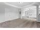 Expansive main bedroom featuring a tray ceiling, soft carpet, and ample space at 49 Ryder Pass Way, Loganville, GA 30052