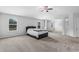 Large main bedroom with natural light, soft carpet, and an open layout at 49 Ryder Pass Way, Loganville, GA 30052