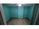 Bedroom with light wood floors, fan, and light blue walls at 497 Prince Of Wales, Stone Mountain, GA 30083