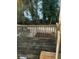 An image of an older wooden deck with a wooden railing at 497 Prince Of Wales, Stone Mountain, GA 30083