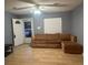 Cozy living room featuring hardwood floors and a comfortable couch at 497 Prince Of Wales, Stone Mountain, GA 30083