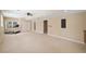 Spacious basement with neutral walls, carpet, windows, closet, and ceiling fan at 530 Summerhill Dr, Roswell, GA 30075