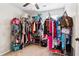 Spacious walk-in closet with shelves, racks, and carpeted flooring at 1126 Mainstreet Valley Dr, Stone Mountain, GA 30088