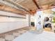 Bright bedroom showcasing exposed wood ceiling beams, a walk-in closet, and carpeted floors at 170 Boulevard Se # E117, Atlanta, GA 30312