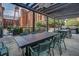Outdoor dining area with long tables, seating, and built-in grills, ideal for entertaining guests at 170 Boulevard Se # E117, Atlanta, GA 30312