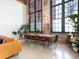 Bright dining area with large windows, exposed brick, and modern lighting at 170 Boulevard Se # E117, Atlanta, GA 30312