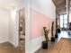 Hallway with views to rooms and with tall cacti in black pots at 170 Boulevard Se # E117, Atlanta, GA 30312