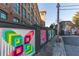 Building exterior featuring colorful street art installations adding character and vibrancy to the property's surroundings at 170 Boulevard Se # E117, Atlanta, GA 30312